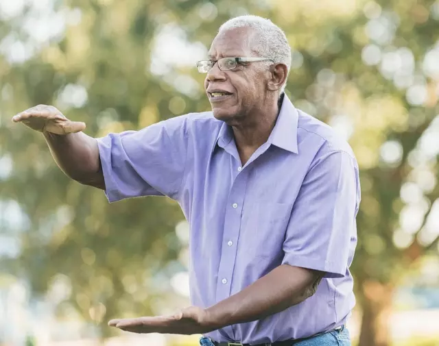 Senior man doing tai chi