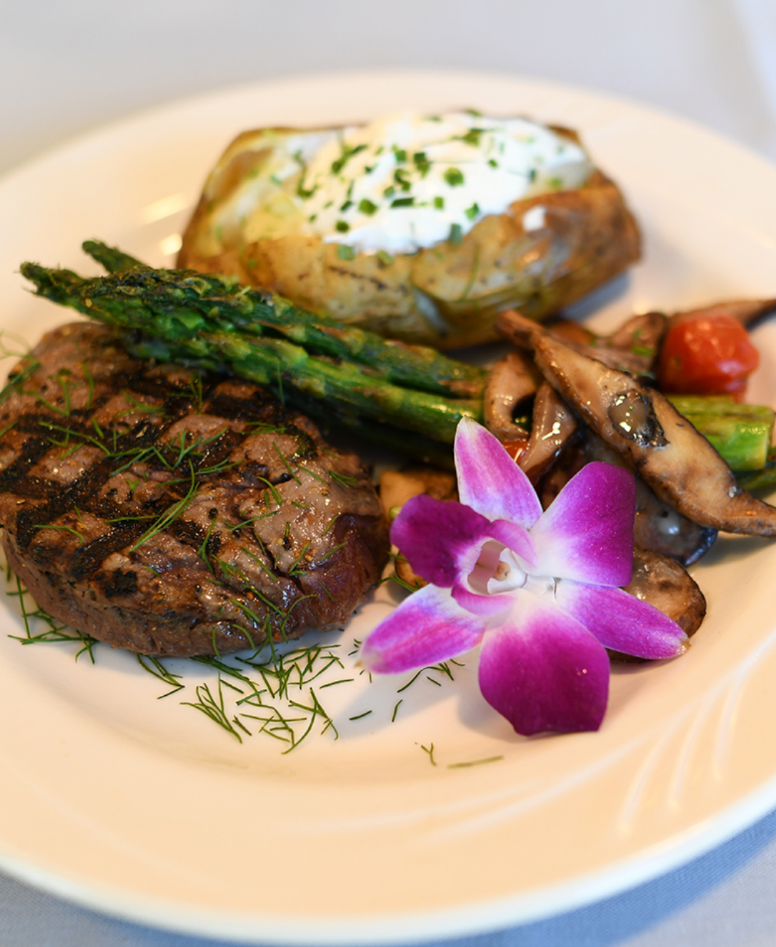 Steak with potato and vegetables