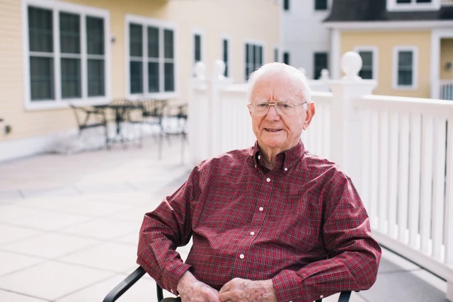 Senior man sitting on deck