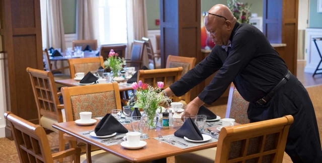 Staff setting up table