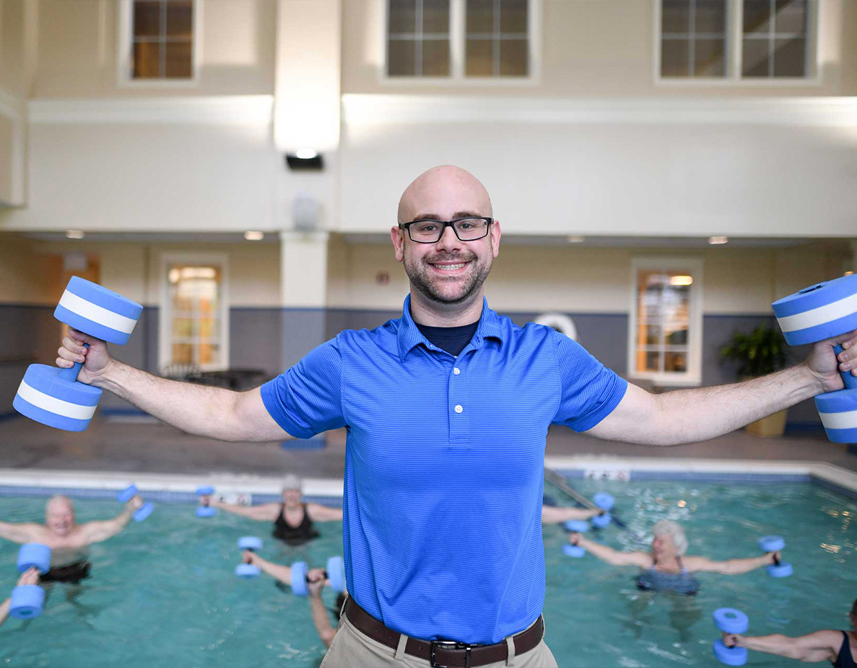 Fitness Specialist Jason Williams leading water aerobics.