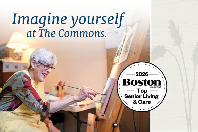 Older woman smiling while painting at an easel in a cozy studio, with text reading “Imagine yourself at The Commons” and a 2026 Boston Magazine Top Senior Living & Care badge.