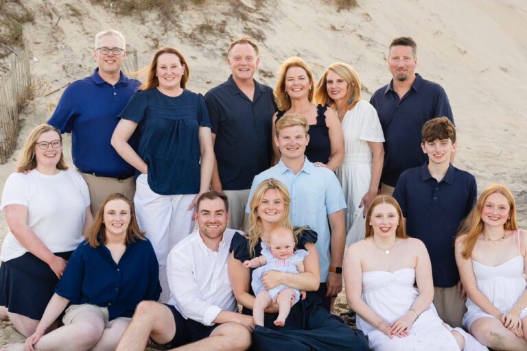 Terry and Merry R.’s extended family gathers for a group photo during a family vacation in the Outer Banks, including their children, grandchildren and first great-granddaughter.