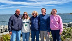 Merry and Terry R. enjoy dinner with their son and two daughters at a lobster restaurant in Cape Elizabeth, Maine.