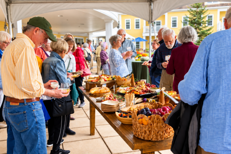 Guests enjoyed seasonal flavors and lively conversation around the harvest table during An Autumn Afternoon at The Commons.